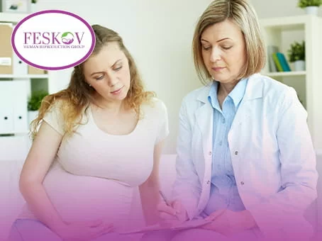A fertility specialist conducts medical screening of a candidate for surrogate mothers to assess her health status.